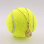 Imagem de colar raquete dourada com zircónia